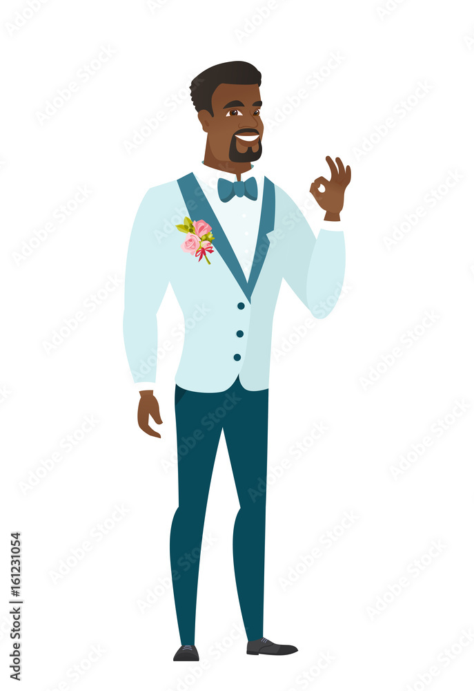 Smiling groom showing ok sign. Smiling groom showing ok sign.