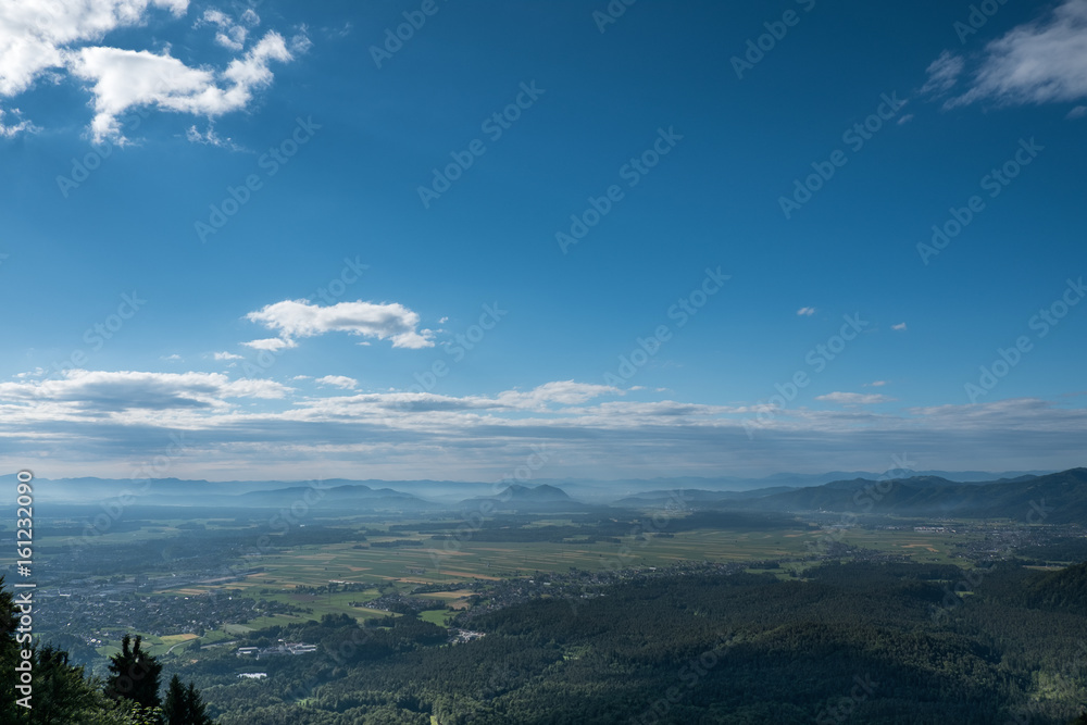 Magnificent view over landscape plateau from the hill; view from Sv. Jost near Kranj towards Ljubljana, Slovenia.
