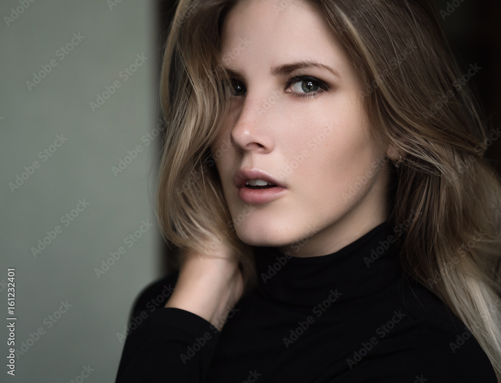 Portrait of beautiful young woman. Selective soft focus.