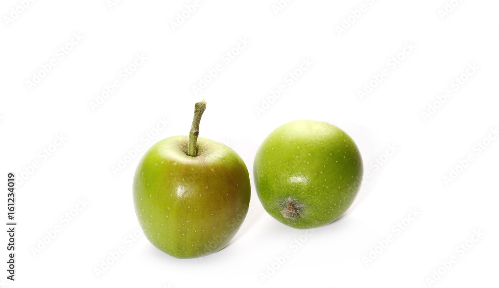 Green young apples isolated on white background Green young apples isolated on white background