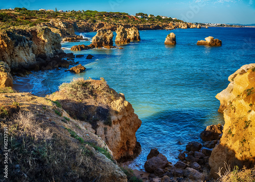 Portugal: beautiful rocks in the coast of Algarve at sunset 