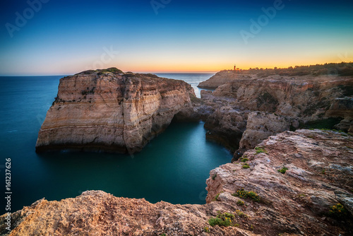 Portugal: beautiful rocks in the coast of Algarve at sunset 