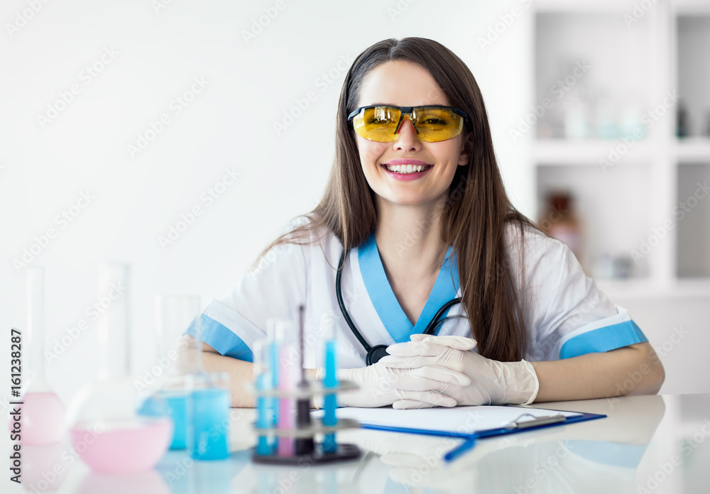 Smiling scientist in chemical laboratory Smiling scientist in chemical laboratory