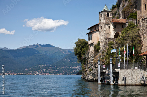 Buildings on rocky cliff face photo