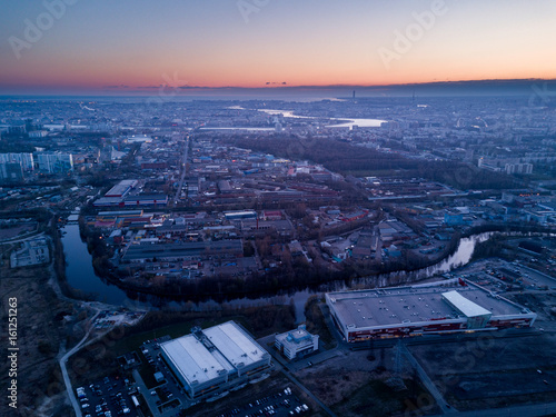 View of the industrial quarter of the city at sunset