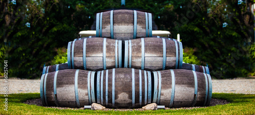 pyramid of barrels on grass