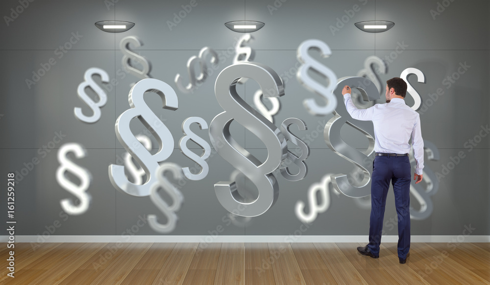 Businessman using law interface on a wall 3D rendering Businessman using law interface on a wall 3D rendering