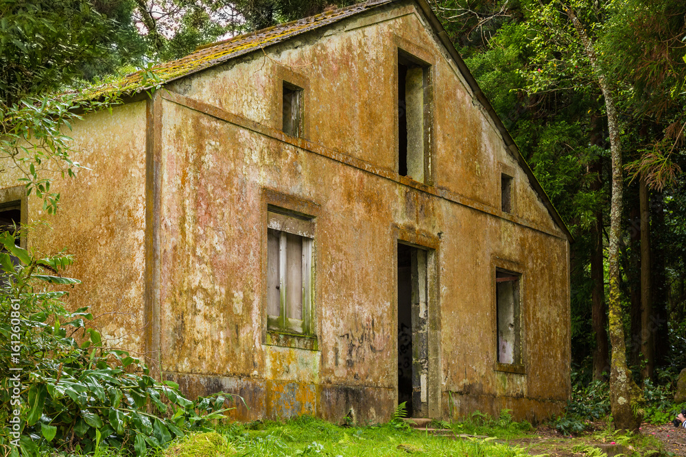 The abandoned ruin of the house at Lake Lagoa das Furnas on the Sao Miguel Island