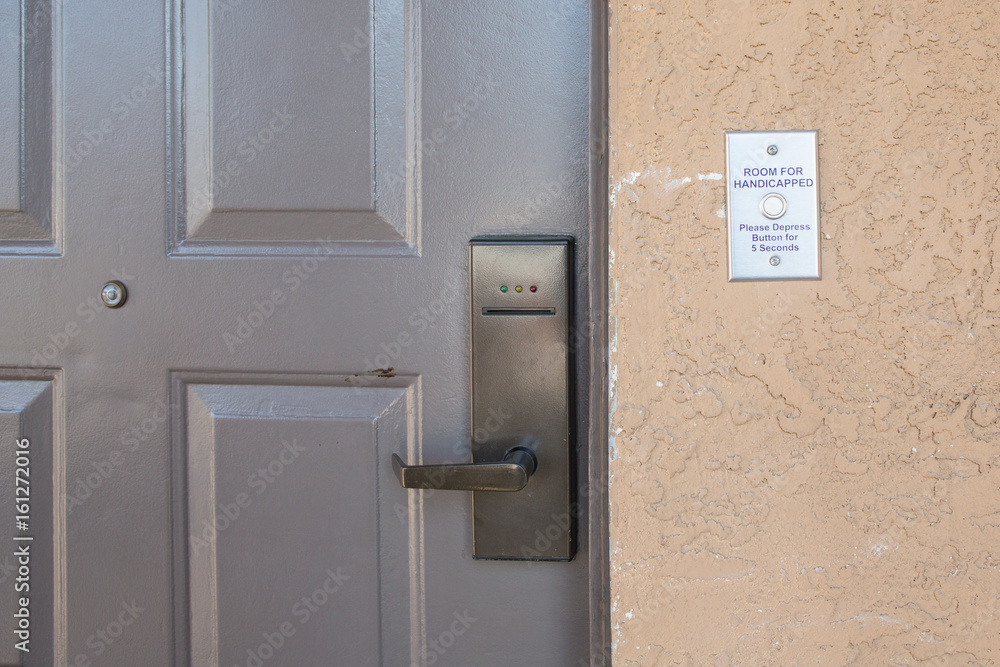 room for handicapped with handicapped button system to open the room