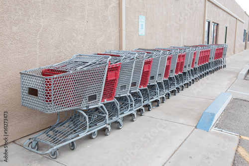 Shopping cart with basket outside the store