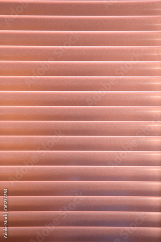 Horizontal pattern of purple venetian blinds