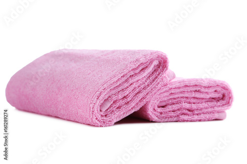 Pink towel isolated on a white background