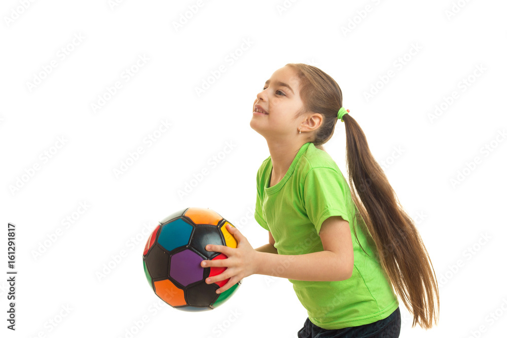 little girl plays with a soccer ball little girl plays with a soccer ball