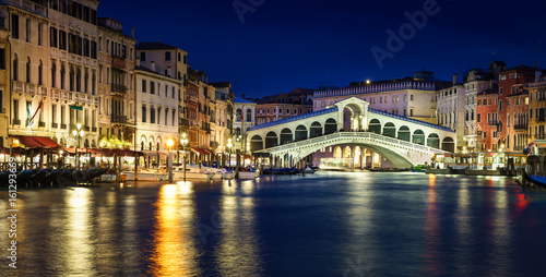 Panorama of Grand Canal and Rialto Bridge at night Venice  Italy