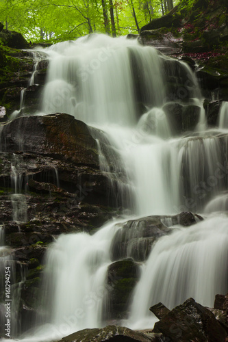 Beautiful mountain waterfall © Iuliia