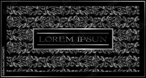Gloomy vintage with intertwined golden plants on a black background with a silver frame and silver plaque for text