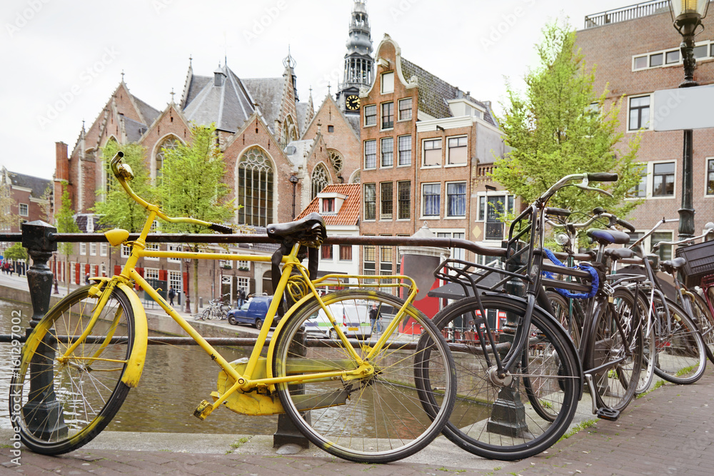 Fototapeta premium Parking place with bicycles for rent on street