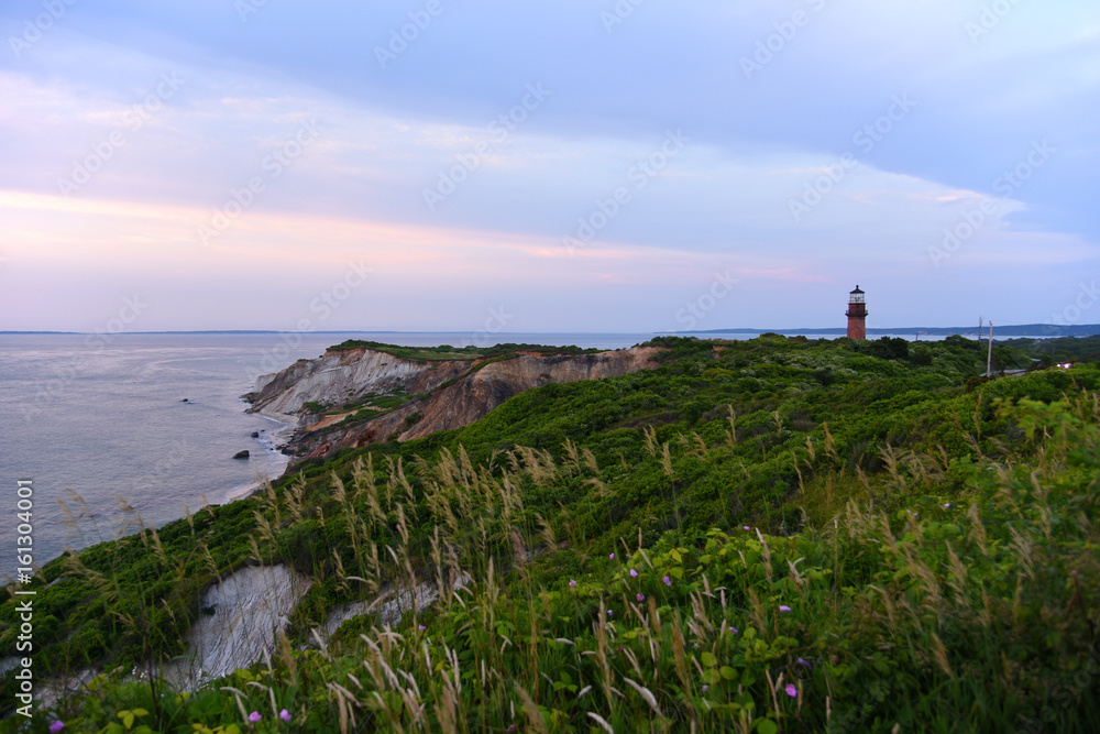 Gay Head Lighthouse and Gay Head cliffs of clay at the westernmost point of Martha's Vineyard in Aquinnah, Massachusetts, USA. This historic lighthouse was built in 1856.