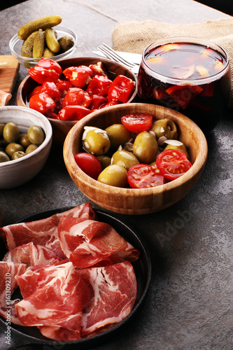 spanish tapas and sangria on wooden table - mediterran antipasti
