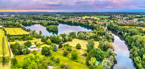 Bild auf Leinwand The Ill river and an artificial lake in the north of Strasbourg - Grand Est, Fra