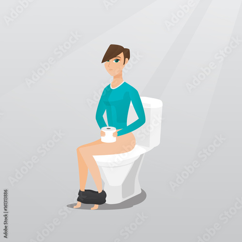 Woman suffering from diarrhea or constipation.
