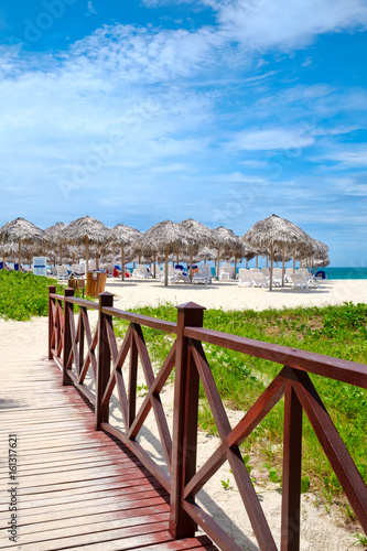 Wooden walkway leading to the shore at the beautiful Varadero beach in Cuba