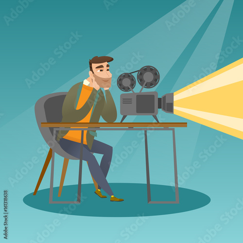 Caucasian projectionist showing a new film.