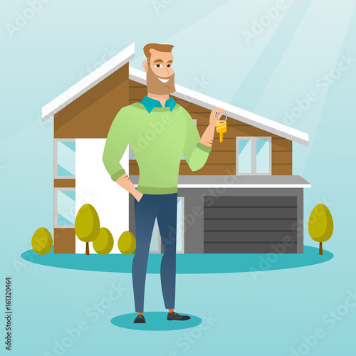 Young caucasian homeowner with key.