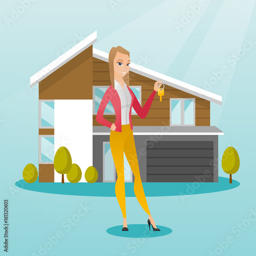 Young caucasian homeowner with key.