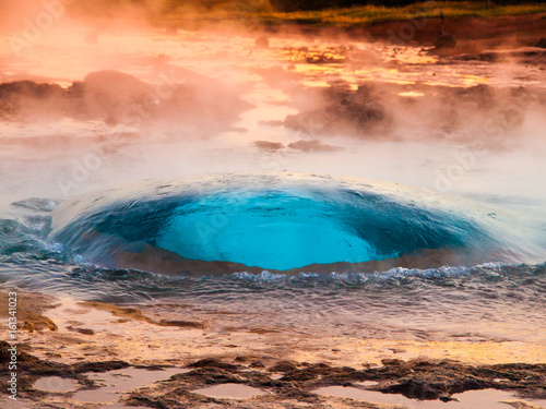 Strokkur geyser just at the explosion moment, Iceland.