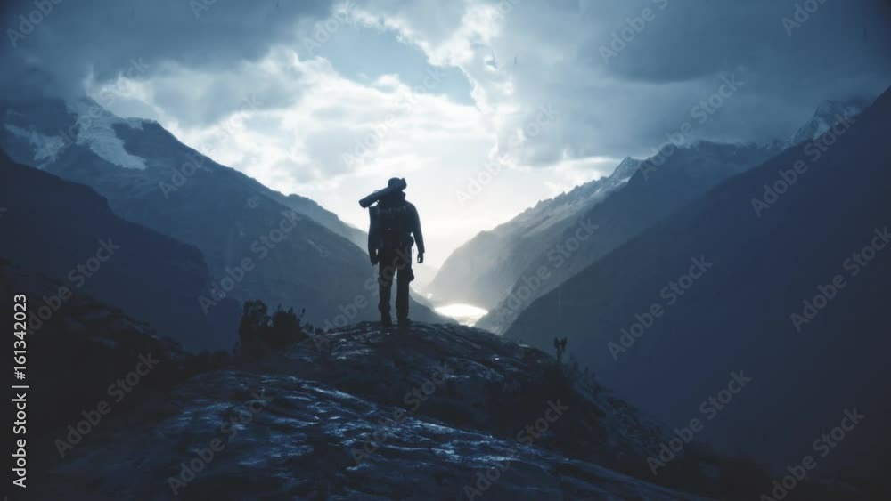 Silhouette of a backpacker walking on the peak of a mountain, Santa cruz Trek, Peru. 4k Silhouette of a backpacker walking on the peak of a mountain, Santa cruz Trek, Peru. 4k
