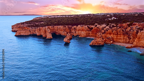 Aerial from famous beach Praia da Marinha in the Algarve Portugal at sunset