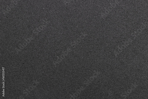 Dark plastic texture with furrows