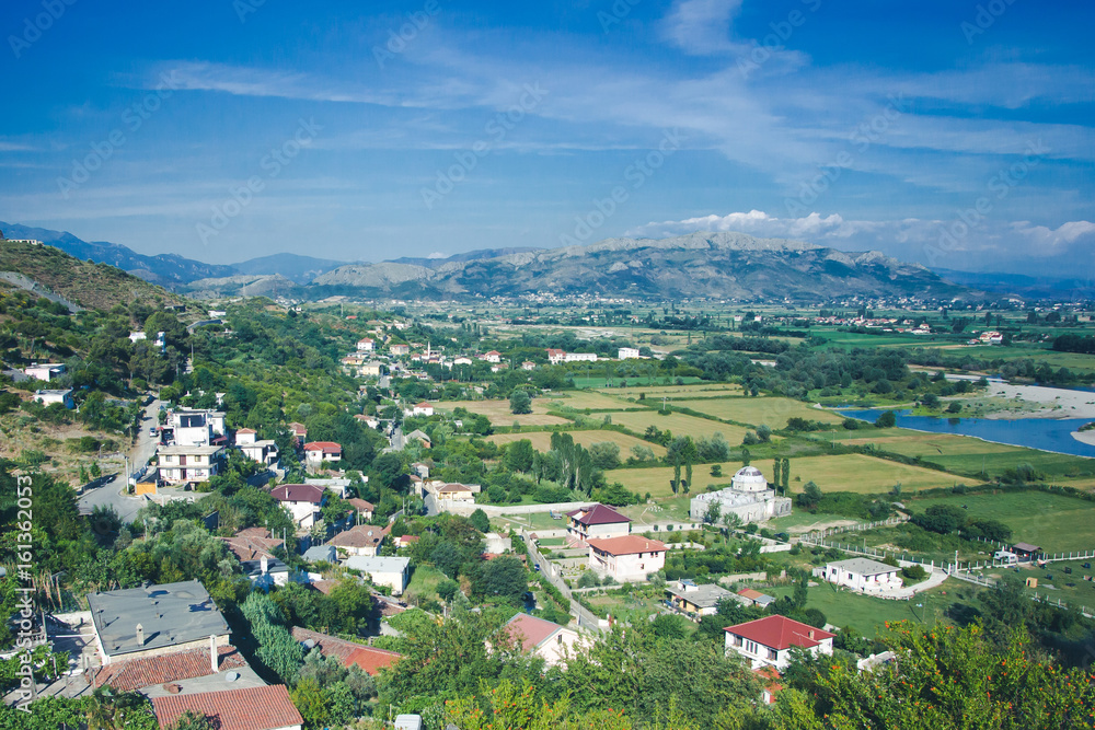 Beautiful sunny summer landscape in Albania. View of Shkoder city from the top of the mountain.