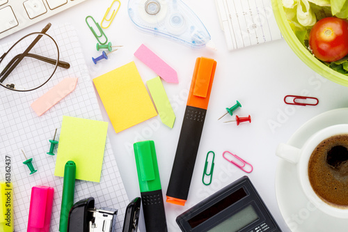 Top View Flat Lay of Business Concept. Office Accessories on white bright table. Above.