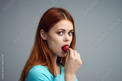 Woman eating strawberries, strawberries, sweet strawberries