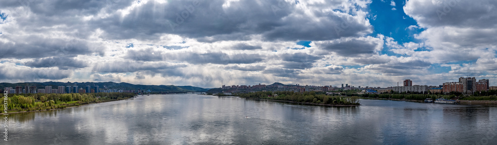 Panorama of the Yenisei River. View from the Communal Bridge in Krasnoyarsk