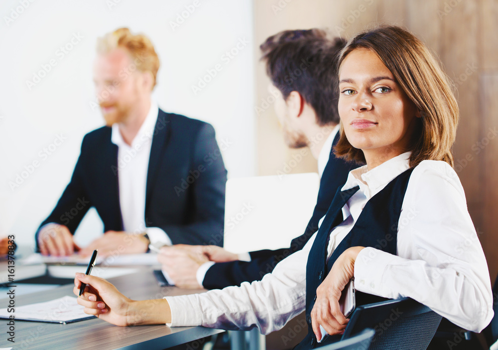 Confident businesswoman during a business meeting Confident businesswoman during a business meeting