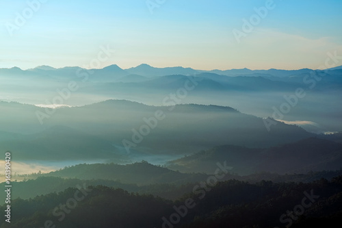 Fog in mountains. Fantasy and nature landscape. Nature conceptual image.