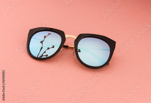 CREATIVE SHOOT OF SUNGLASSES WITH COLOURFUL BACKGROUNDS AND COOL PROPS © ramakant