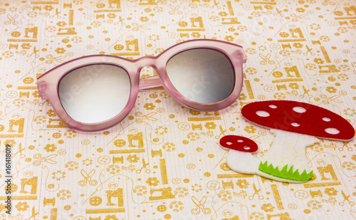 CREATIVE SHOOT OF SUNGLASSES WITH COLOURFUL BACKGROUNDS AND COOL PROPS