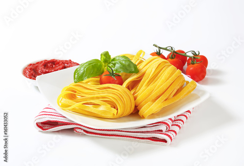 Tagliatelle pasta and tomato paste