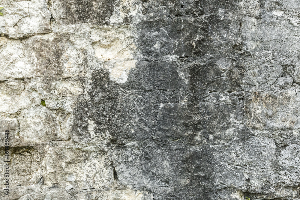 Old grungy gray stone wall texture Old grungy gray stone wall texture