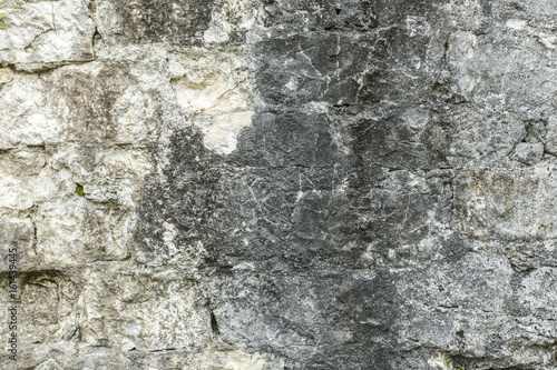 Old grungy gray stone wall texture