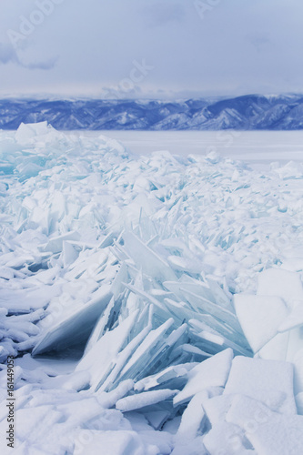 Hummock ice floes. Baikal lake winter landscape.
