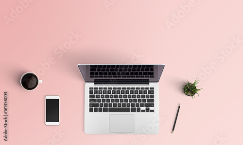 Modern workplace with notebook, coffee cup, tree, smartphone and pencil copy space on color background. Top view. Flat lay style.
