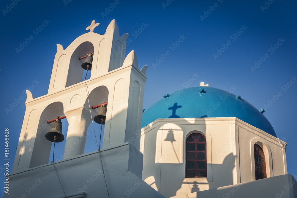 Santorini famous blue dome church, Greece. Cyclades Islands