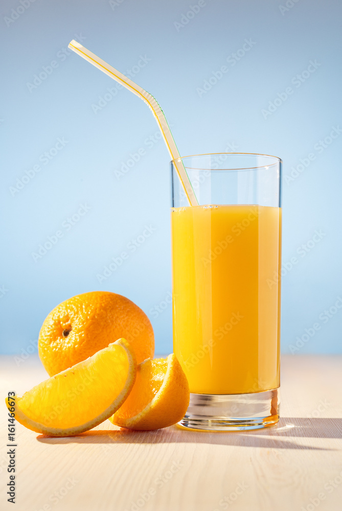 Orange juice in a glass. Orange juice in a glass.