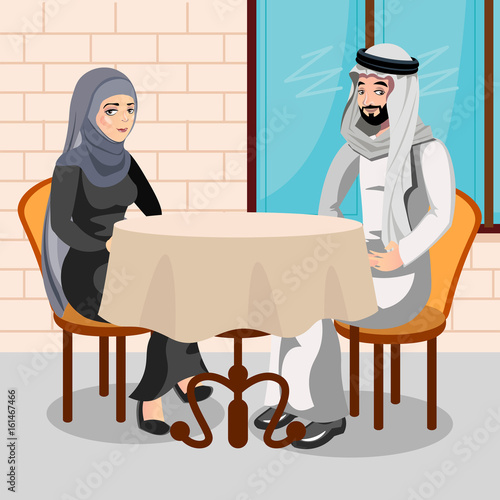 Eastern people having dinner in restaurant