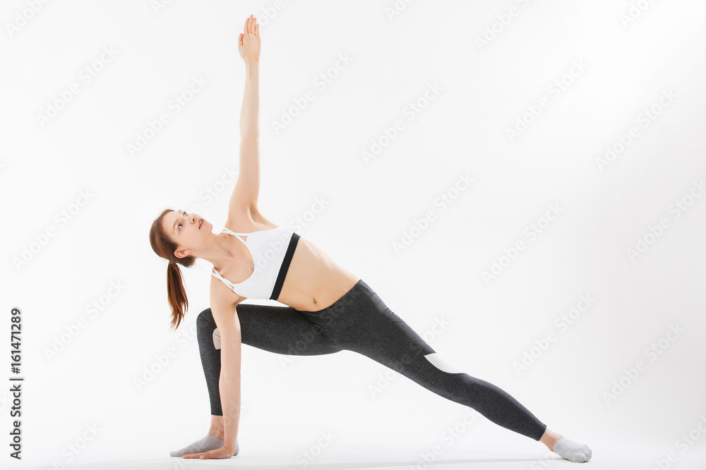 Young woman exercise yoga supported headstand Young woman exercise yoga supported headstand